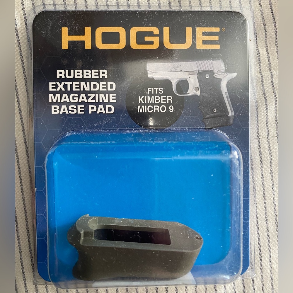 Hogue rubber extended magazine base pad. OD green.